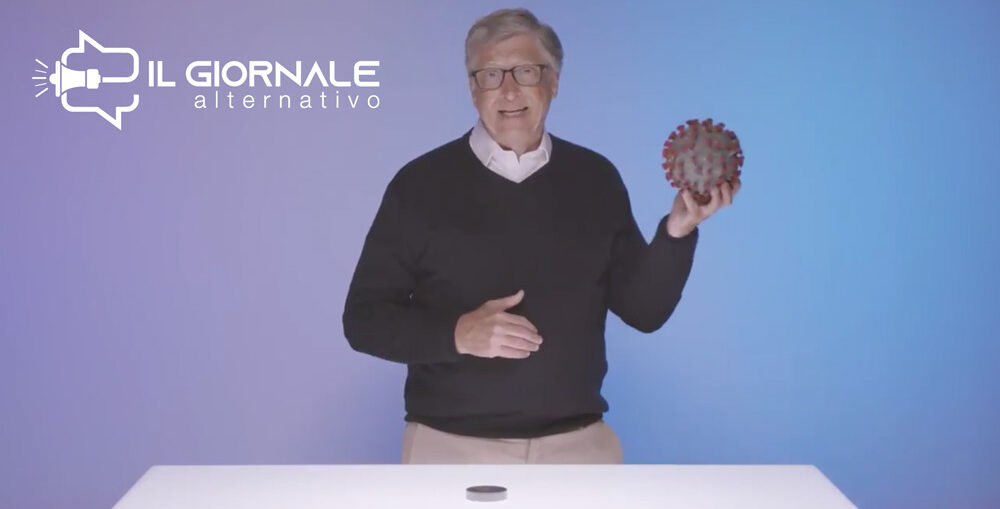 Bill Gates con in mano un solido di SARS-COV-2 mentre parla della pandemia