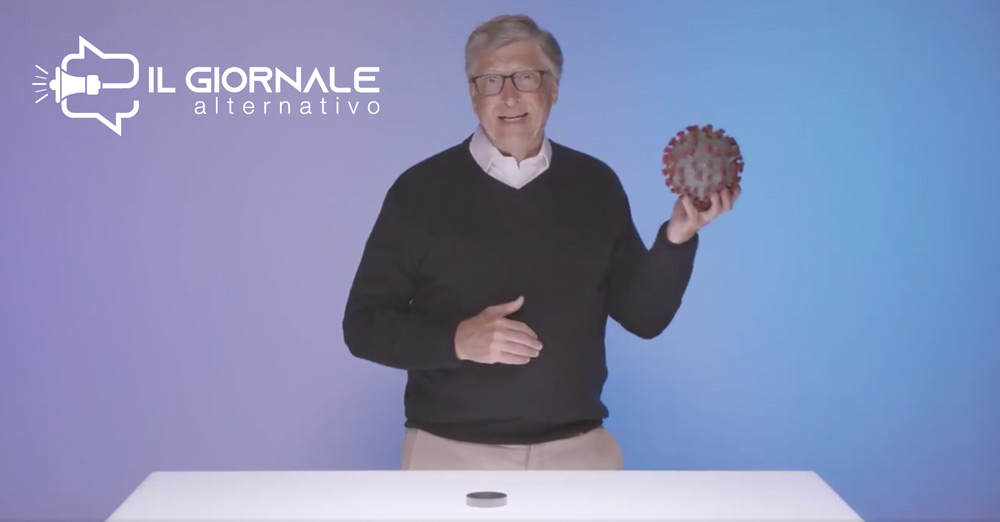 Bill Gates con in mano un solido di SARS-COV-2 mentre parla della pandemia